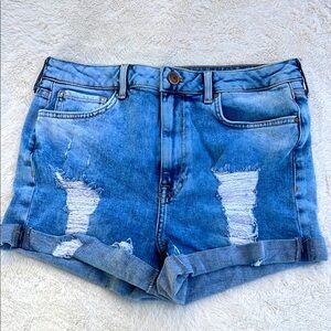 Forever 21. Size 27. Distressed denim cut off shorts.